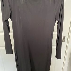 Black open back mini dress.